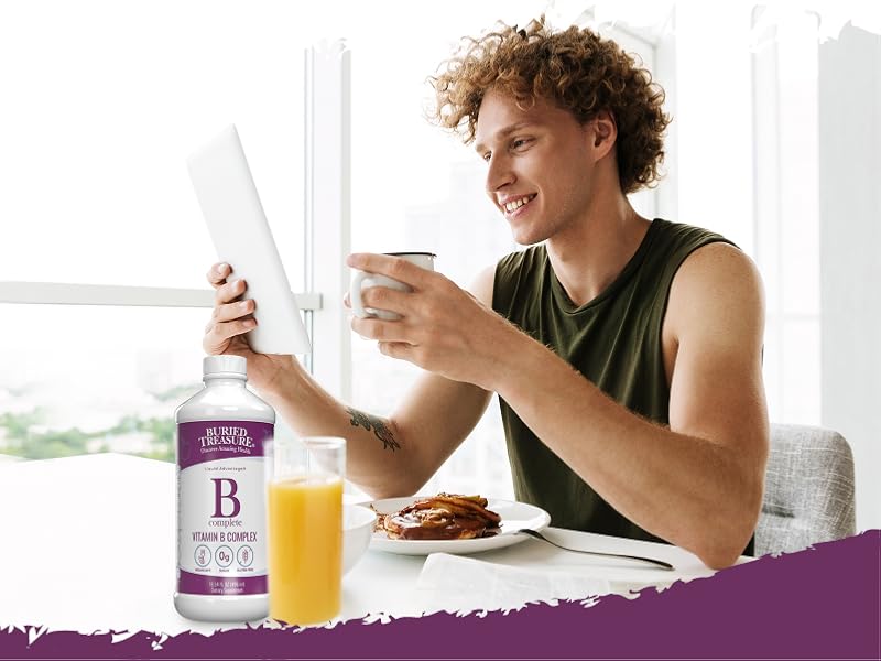 Man eating breakfast with bottle of B Complete