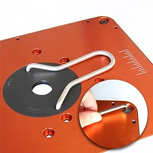 Aluminum router table plate with starting pin for smoother pattern routing