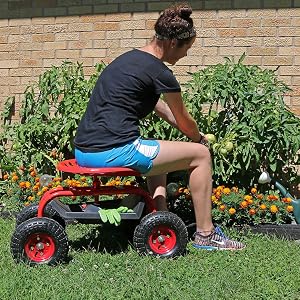 girl on cart while working on landscaping
