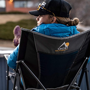 woman sitting on Folding Camp Chair