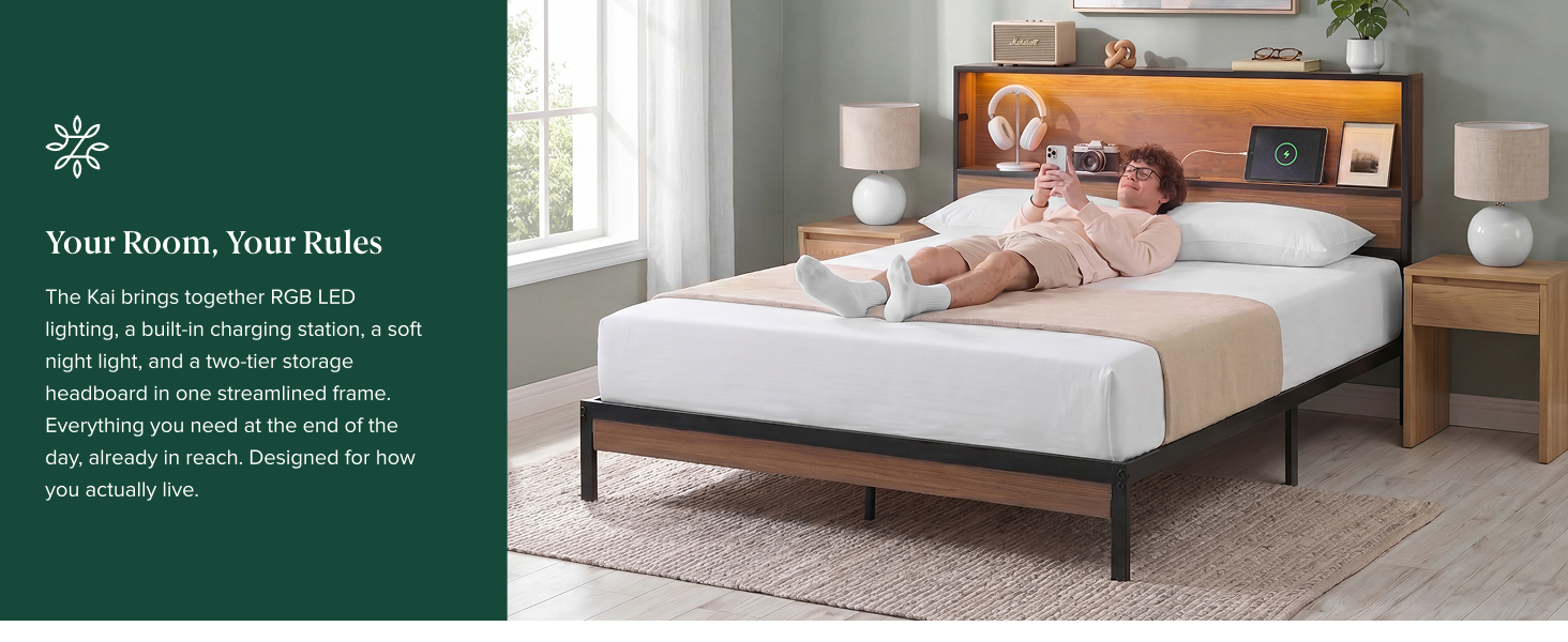 Person relaxing on the Zinus Kai Platform Bed Frame with warm amber LED headboard lighting
