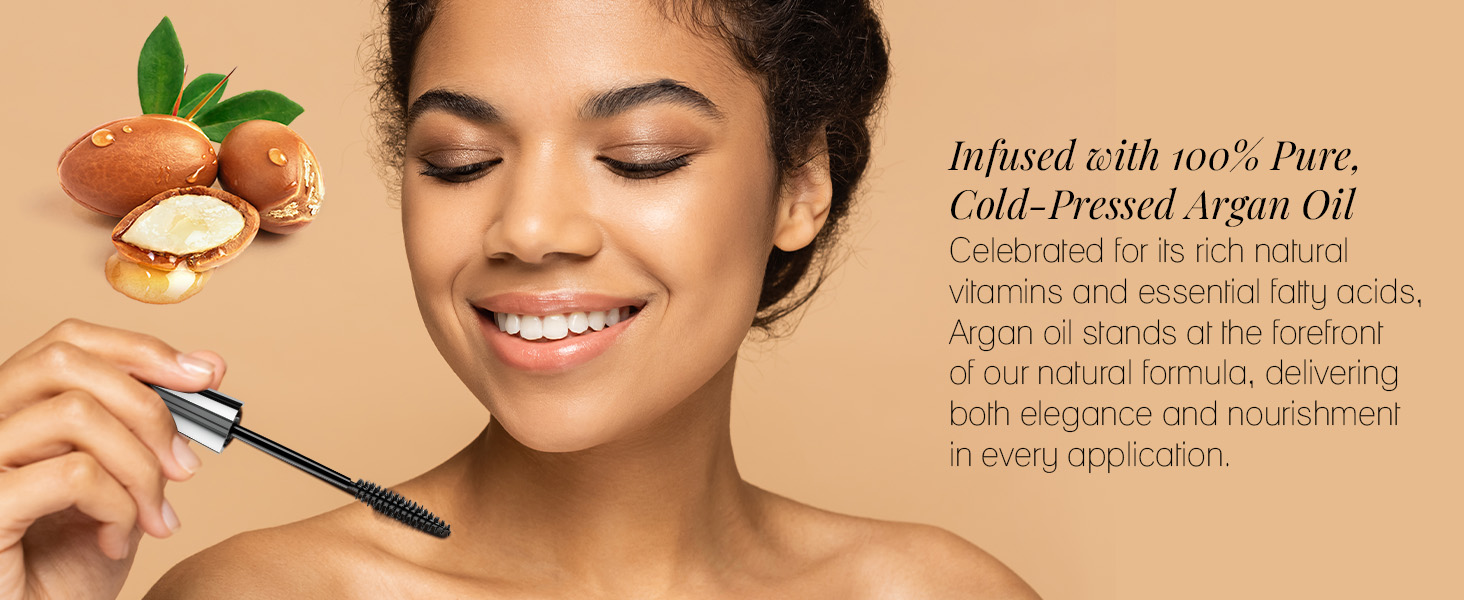 close up of mascara applied to eyelashes, with elements of argan oil