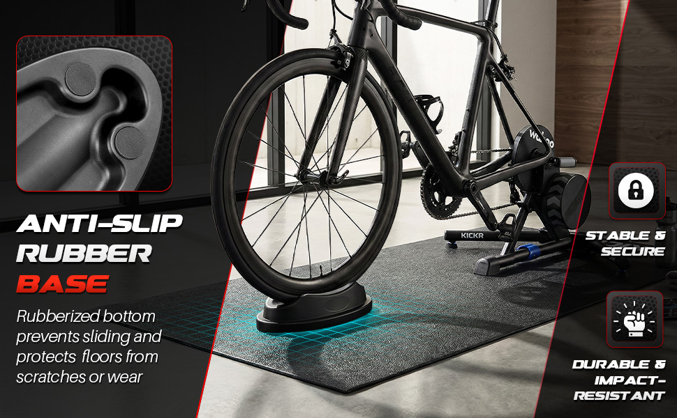 Close-up of the bicycle trainer wheel block showing the anti-slip rubber base resting securely