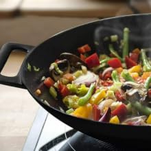wok; grilling wok; cast iron wok; cast iron grilling wok; iron wok; outdoor cooking; bbq; grilling;
