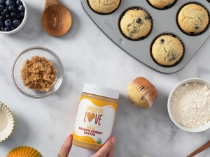 Organic Peanut Butter next to muffins