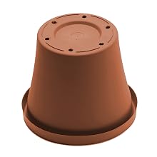 Terra pot planter in Terra Cotta color, upside down.