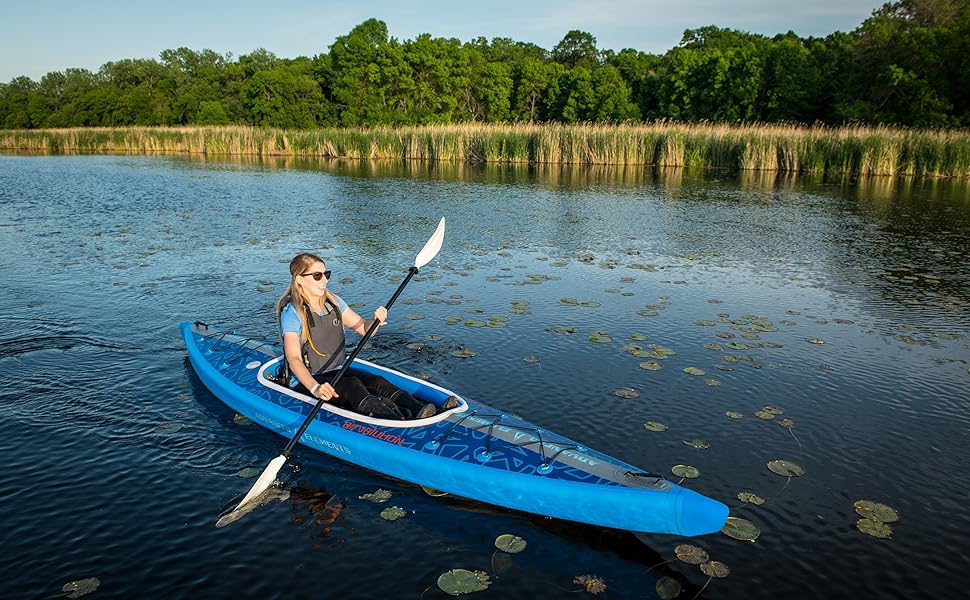 woman paddling kayak
