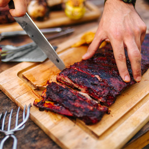 Man cutting meat