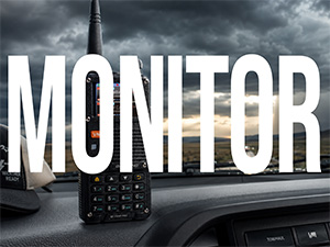 BF-F8HP PRO on a vehicle dash with bold MONITOR text for airband, NOAA, and receive listening.