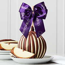 Triple Chocolate Jumbo Caramel Apple topped with a Signature Mrs Prindables Purple Ribbon