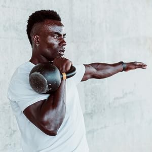 Man holding kettlebell