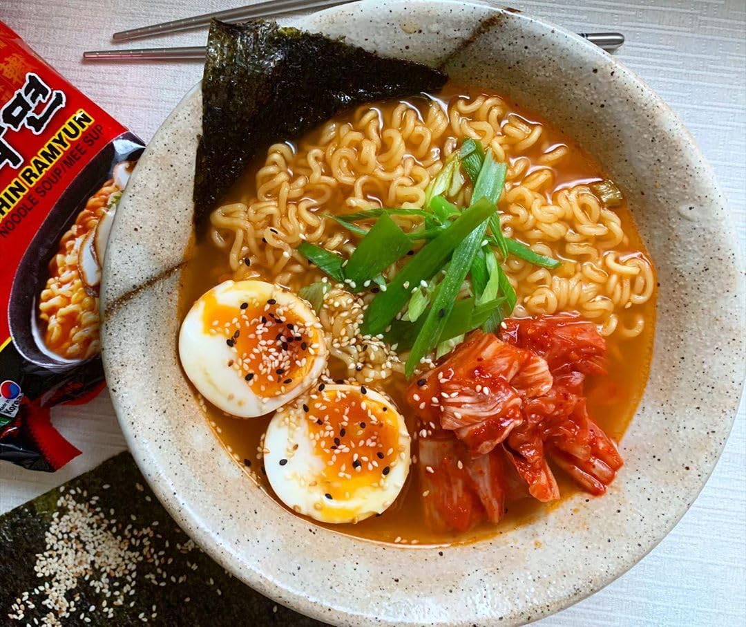 Nongshim Shin Ramyun Noodles, Spicy Korean Signature Instant Ramyun, Rich Beef Flavored Broth, Microwaveable, Korean Instant Noodles, 4.23 oz (Pack of 20), Packaging May Vary.