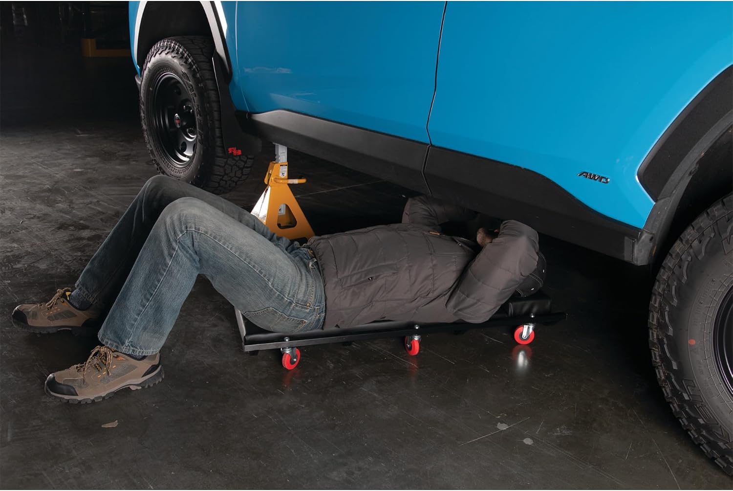 Performance Tool W85014 38 in. Low-Profile Automotive Mechanics Creeper | Oversized x-frame low profile creeper with 2-inch extra cushion padding. 5-inch jumbo swivel casters. 300 lb. capacity