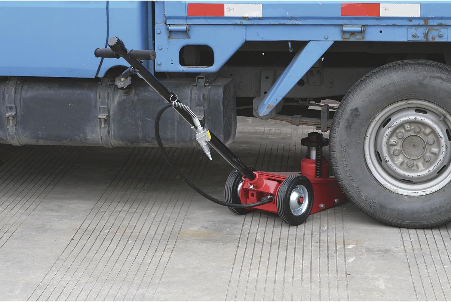 Strongway 22-Ton Quick Lift Air/Hydraulic Service Floor Jack | Controlled vehicle lifting, heavy shop use, stable positioning, professional garage service, durable steel construction