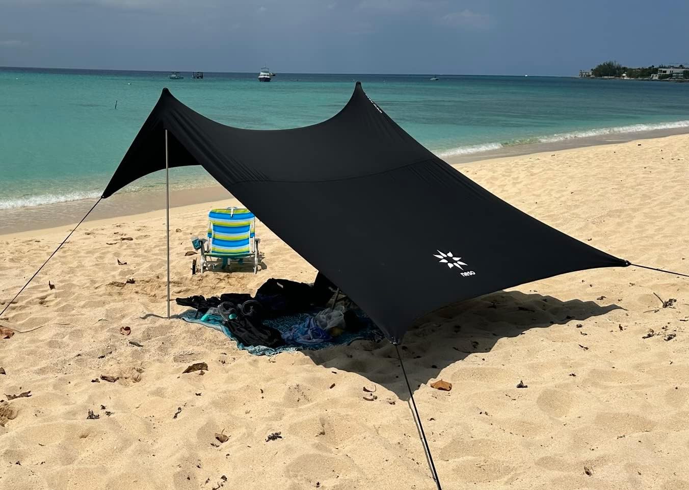 Neso Portable Beach Tent Sun Shelter with Sand Anchor - Lightweight Beach Shade Canopy - Easy Setup for Family Outings - Patented Reinforced Corners - UPF 50+ Sun Protection - 7 x 7ft - White