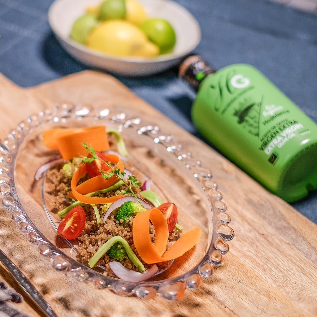 HACIENDA GUZMÁN - Organic and Bio Extra Virgin Olive Oil Hojiblanca. Ideal for grilled or fresh vegetables and white fish. Available in 16.9 FL OZ