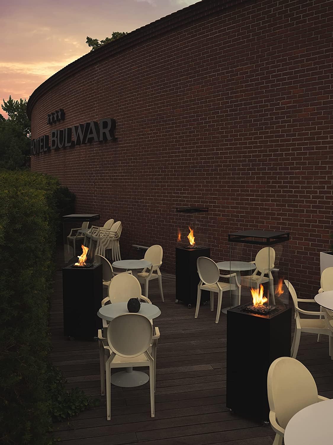 Planika Faro 41, 000 BTU Propane Patio Heater 59" Modern Freestanding Glass Tower with Wheels, Smokeless 360° Flame