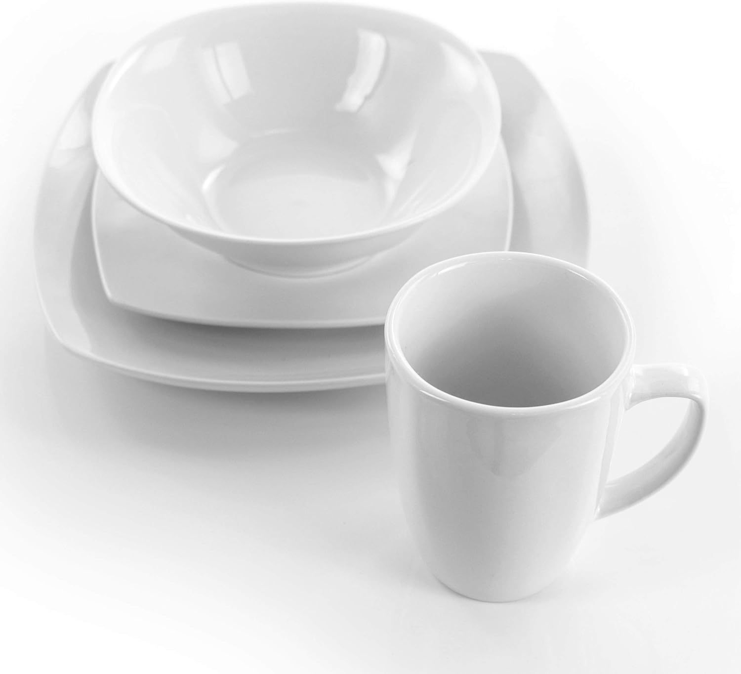 Elama Cara 16 Piece Round Porcelain Dinnerware Set in White