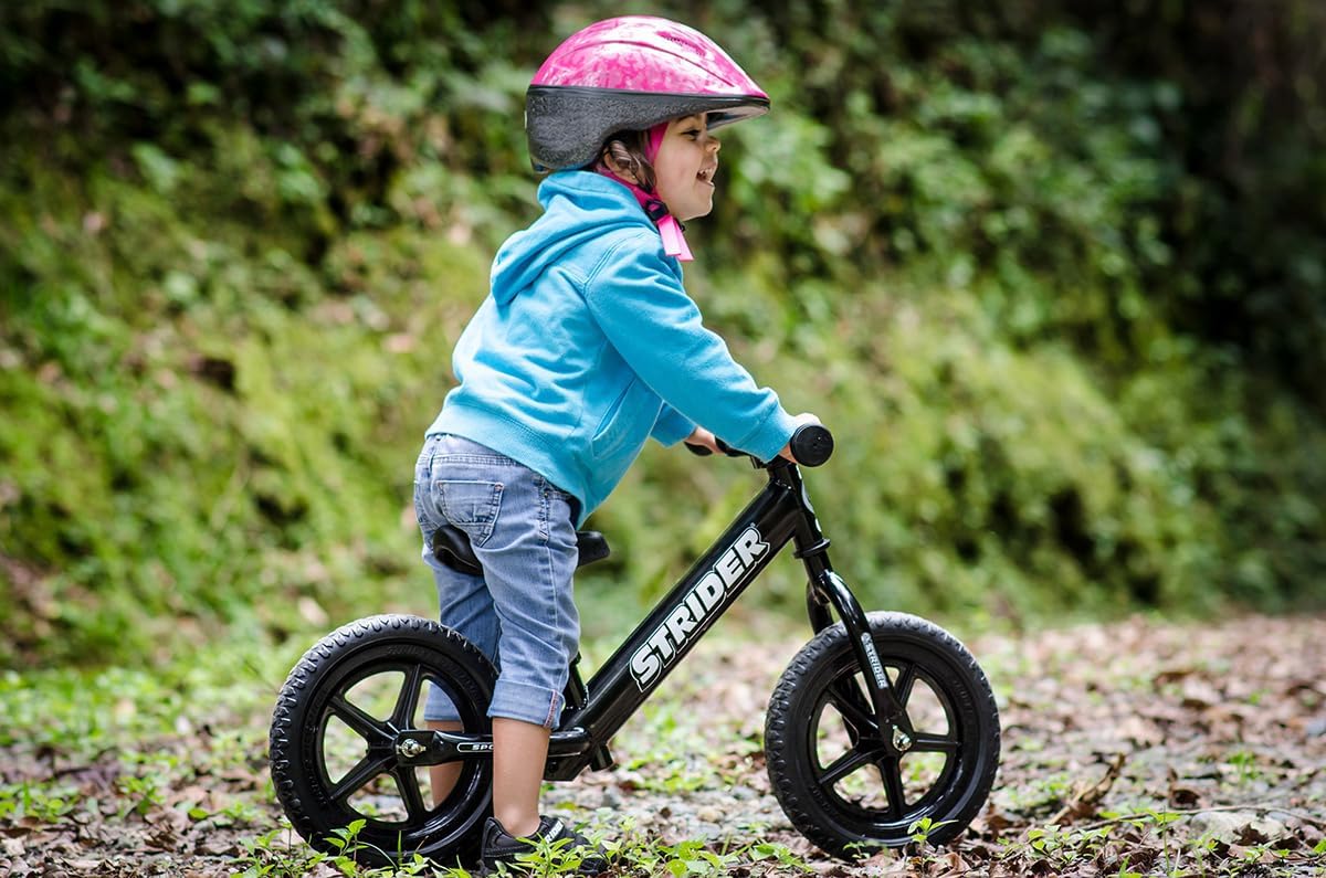 Strider 12 Sport Bike, Pink - No Pedal Balance Bicycle for Kids 1 to 4 Years - Includes Safety Pad, Padded Seat, Mini Grips, Flat-Free Tires -Easy Assembly, Tool-Free Adjustments | No-Pedal Balance Bike for Toddlers, Safety Pad, Adjustable Seat and Handl…