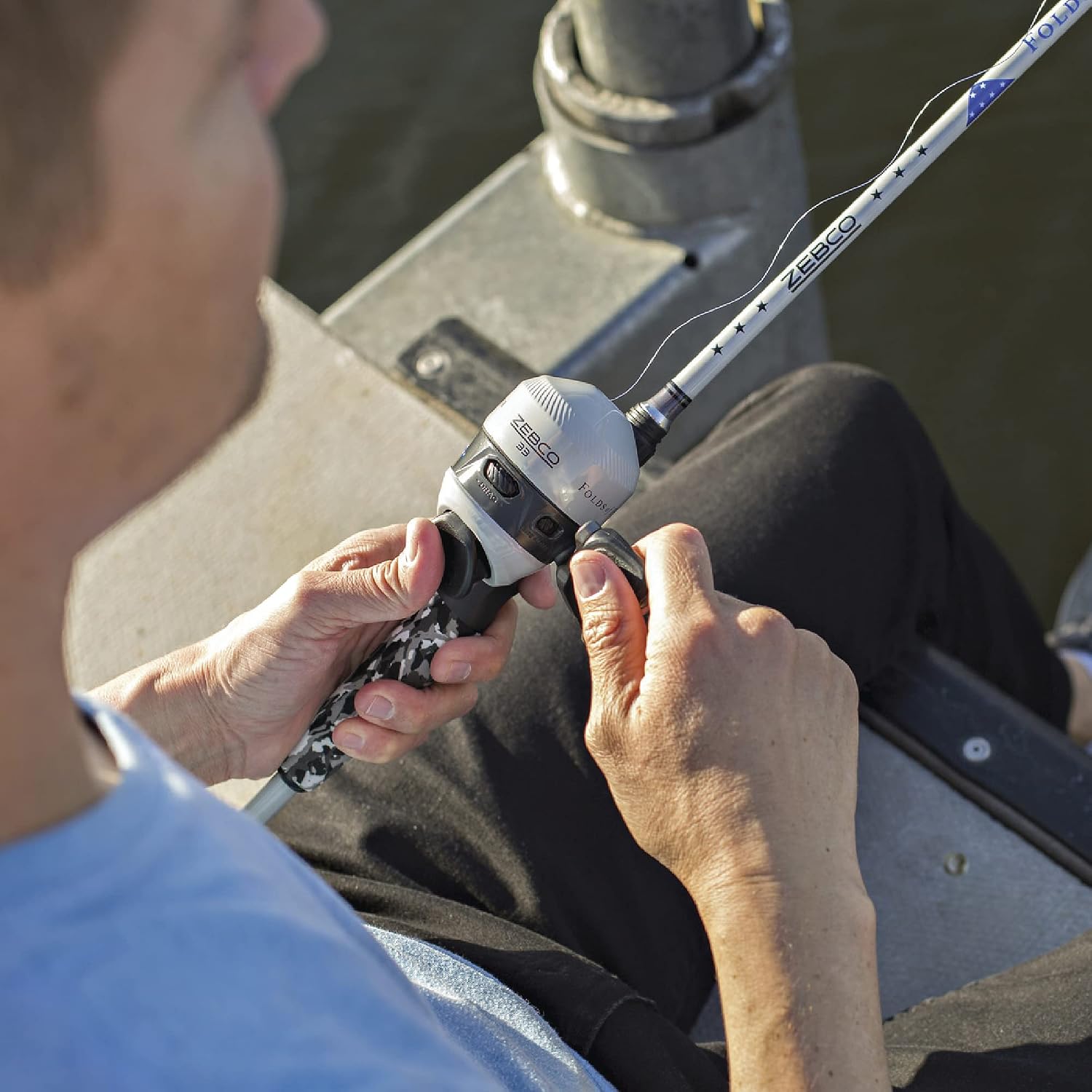 Zebco 33 Folds of Honor Spincast Reel and 2-Piece Fishing Rod Combo, 6-Foot Fiberglass Rod, Quickset Anti-Reverse Fishing Reel with Bite Alert