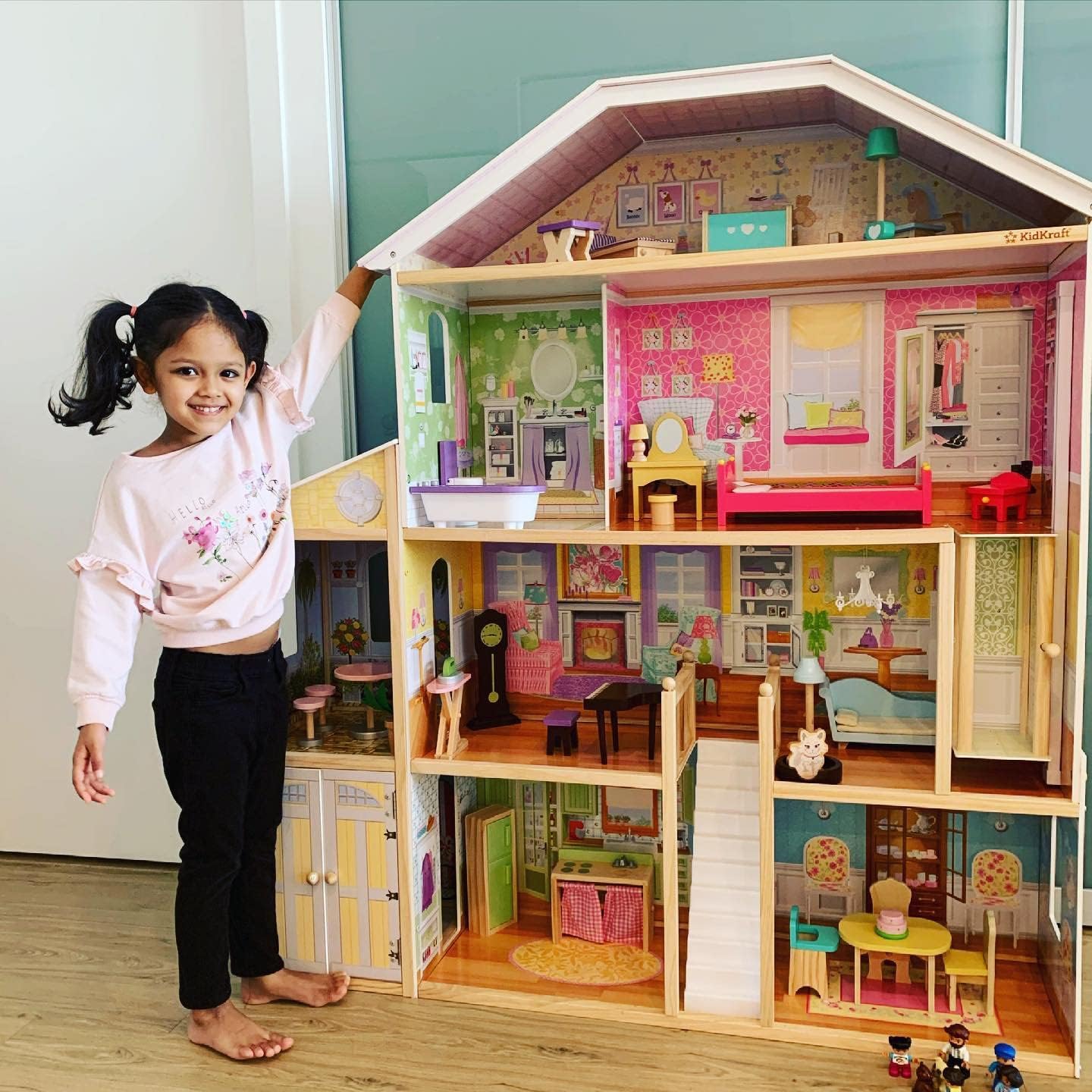 KidKraft Majestic Mansion Wooden Dollhouse with 34 Pieces, Working Elevator | 4 Feet Tall, Garage, 4 Floors, 8 Rooms, Attic Nursery