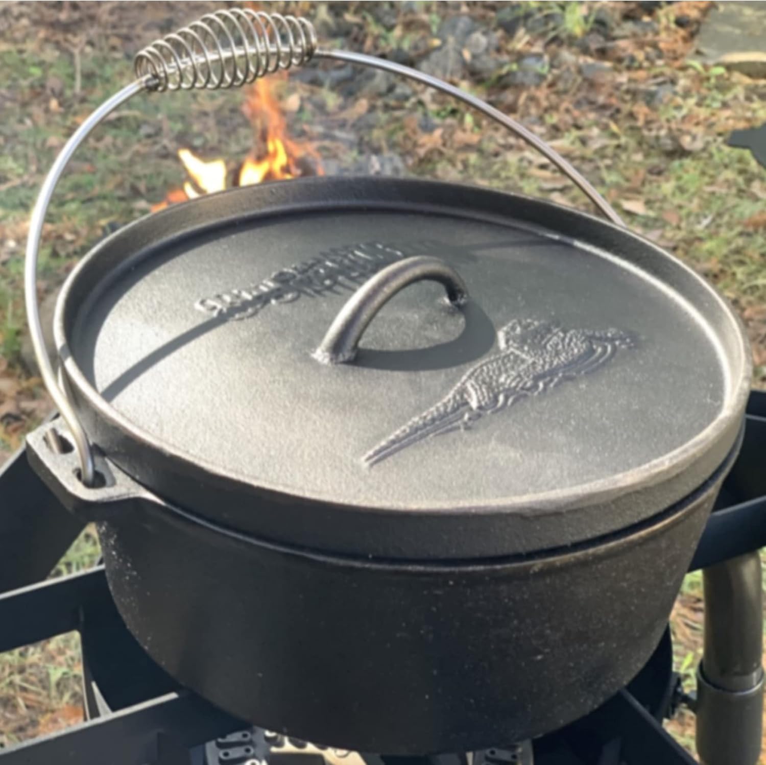 Bayou Classic 7402 2-qt Cast Iron Dutch Oven Features Flanged Camp Lid Stainless Coil Wire Handle Grip Perfect To Use Over A Campfire To Prepare
