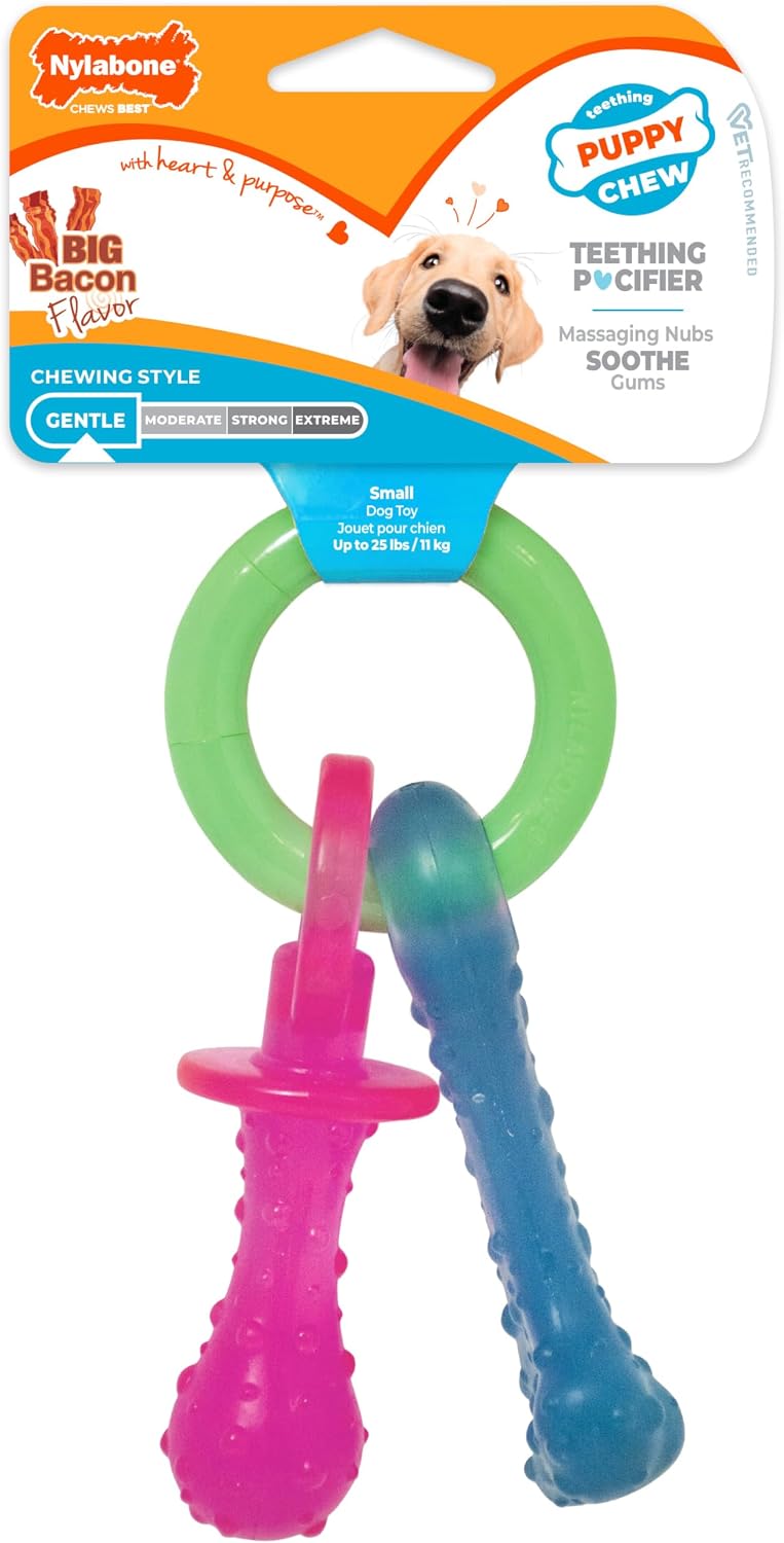 Nylabone Puppy Pacifier Chew Toy, Teething Toys for Puppies up to 25 lbs | Puppy teething toys with bacon flavor, soft material, textured nubs massage gums