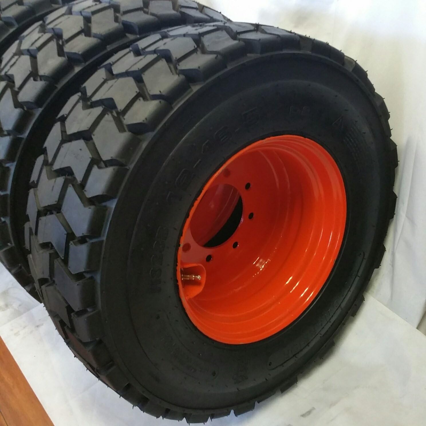 Set of Four (4) 12-16.5 ROAD CREW RS102 14 PLY Skid Steer Loader Tire with Orange Color Rims mounted, RS-102