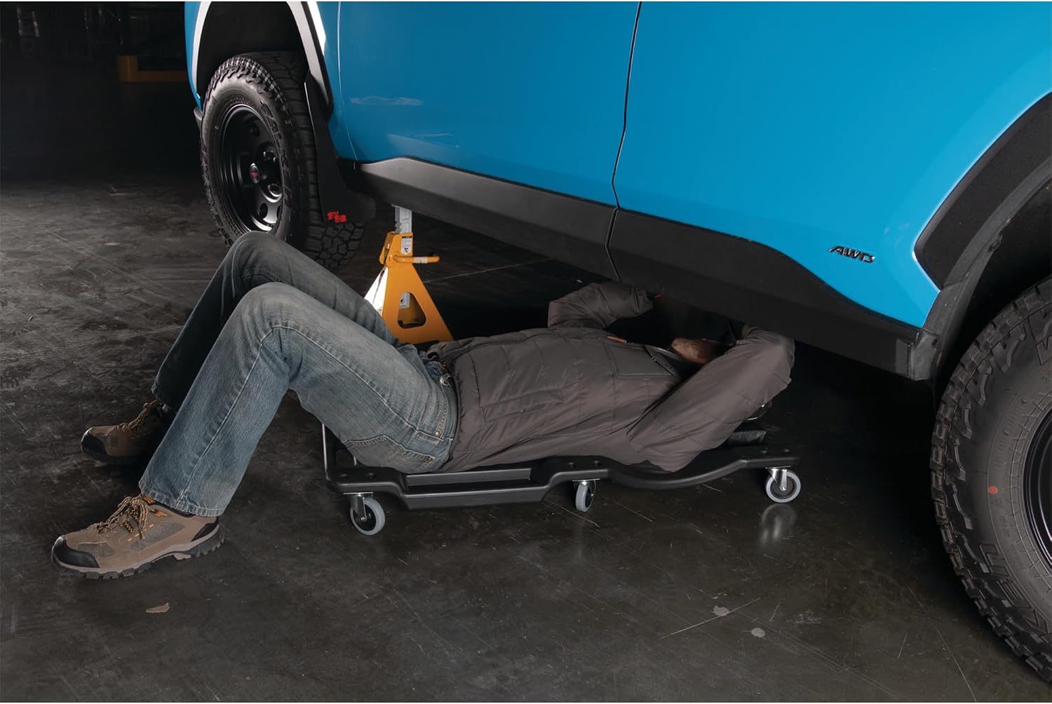 Performance Tool W85014 38 in. Low-Profile Automotive Mechanics Creeper | Oversized x-frame low profile creeper with 2-inch extra cushion padding. 5-inch jumbo swivel casters. 300 lb. capacity