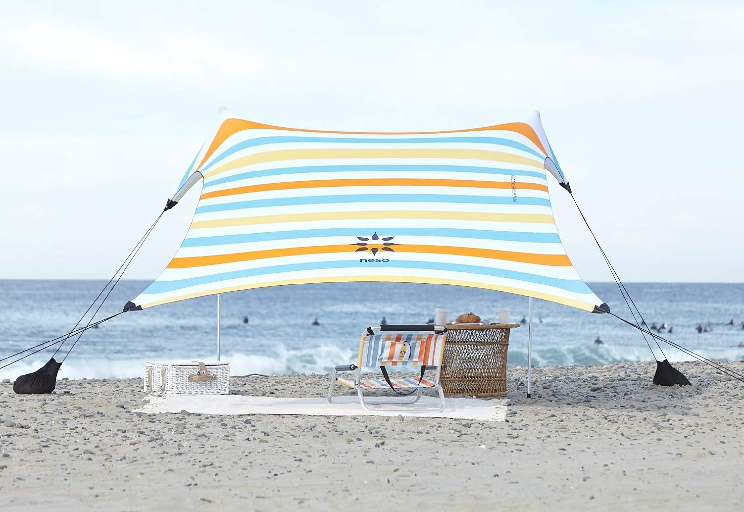 Neso Portable Beach Tent Sun Shelter with Sand Anchor - Lightweight Beach Shade Canopy - Easy Setup for Family Outings - Patented Reinforced Corners - UPF 50+ Sun Protection - 7 x 7ft - White