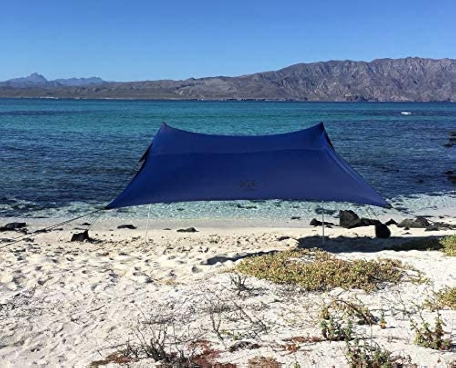 Neso Portable Beach Tent Sun Shelter with Sand Anchor - Lightweight Beach Shade Canopy - Easy Setup for Family Outings - Patented Reinforced Corners - UPF 50+ Sun Protection - 7 x 7ft - White