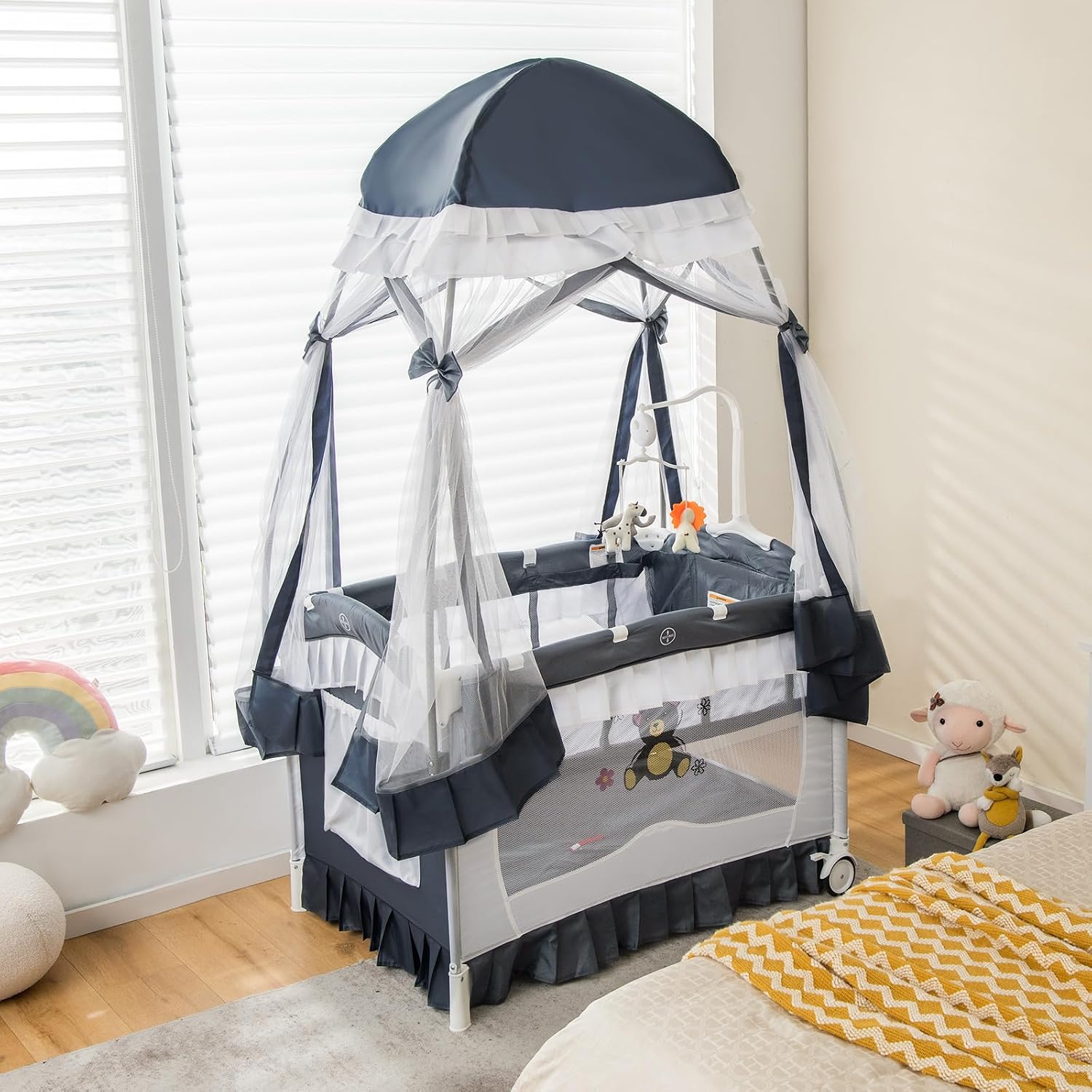HONEY JOY 4-in-1 Pack and Play with Canopy, Portable Baby Playard w/Changing Table and Infant Bassinet Cute Toys & Music