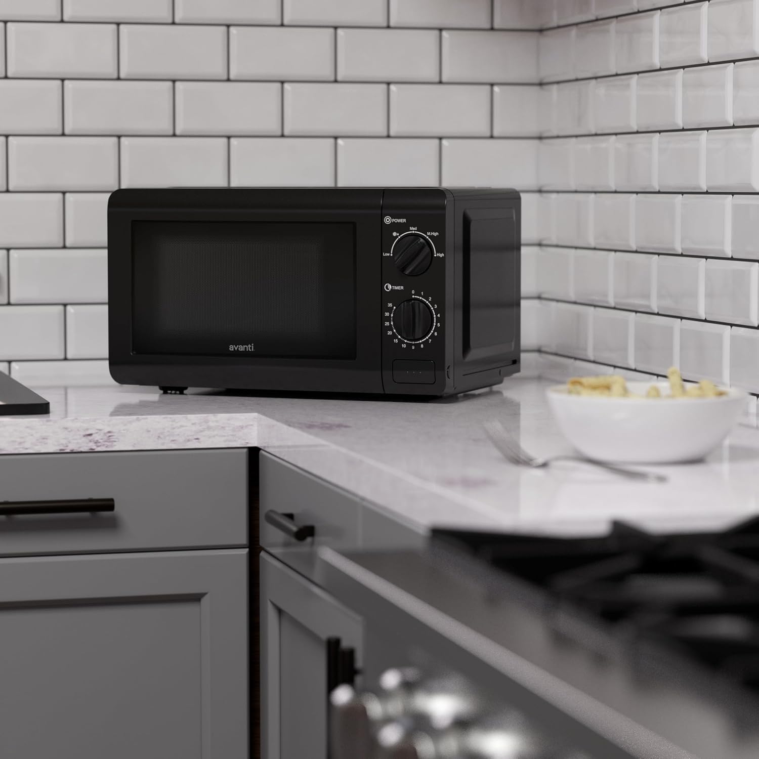 Avanti Microwave Oven 700-Watts Compact Mechanical with 5 Power Settings, Defrost, Full Range Temperature Control and Removable Glass Turntable