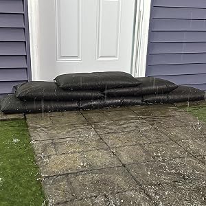 Flood Bags stacked at door protecting against water