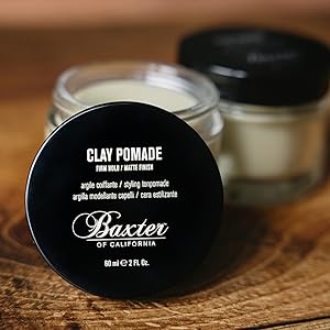 Jar of Clay Pomade and swipe in a dark background