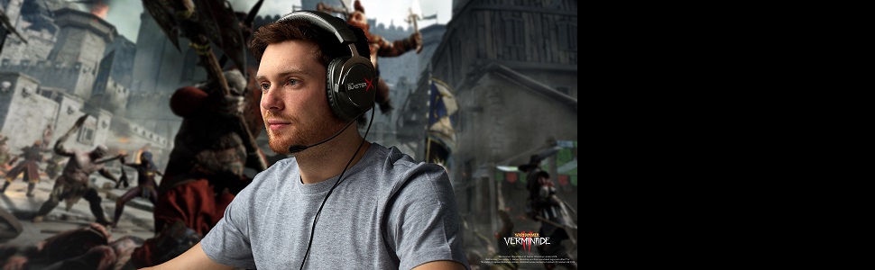 a gamer wearing a headset connected to sound blasterx g6