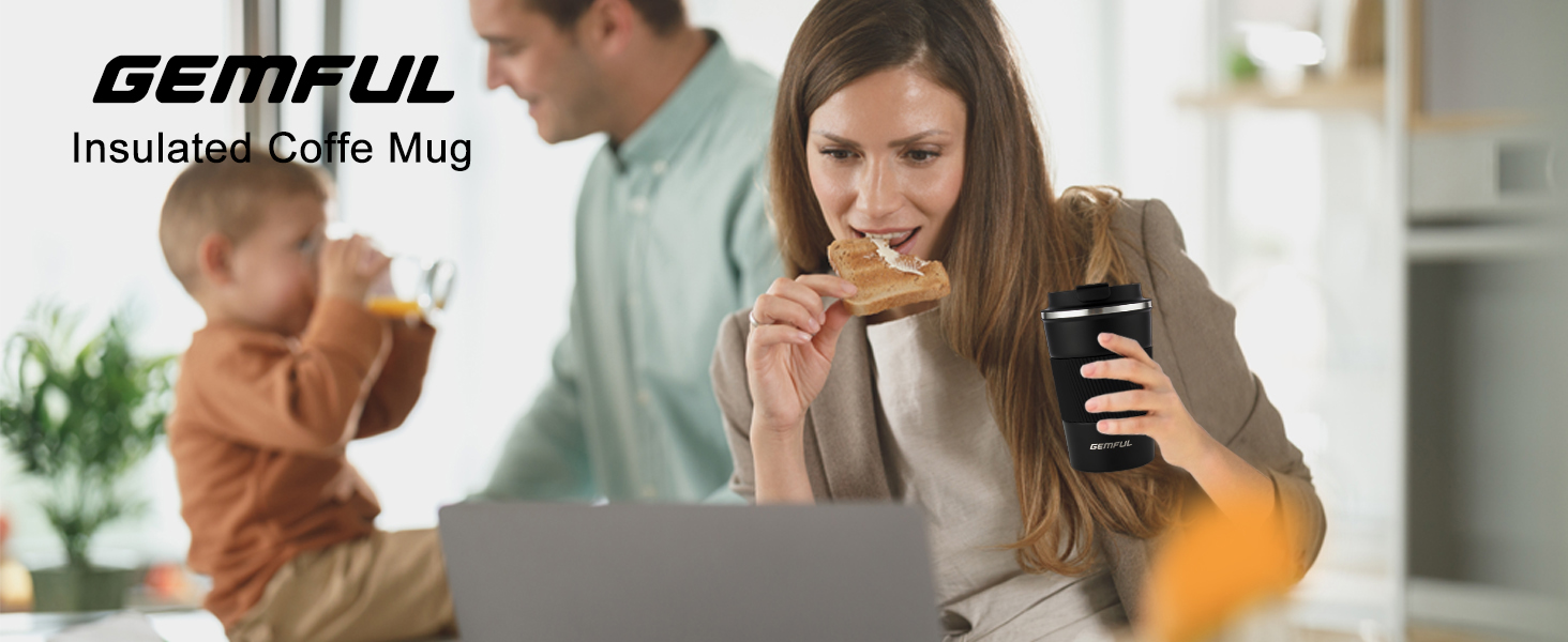 a woman eating toast while sitting at a desk.