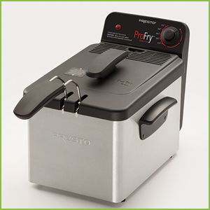 Cover acts as a spatter shield when lowering food into hot oil.