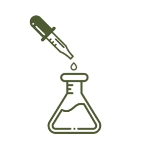 Dropper of liquid dropping into a chemistry flask