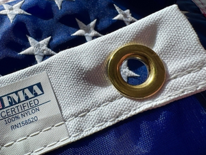 Duck cloth Canvas header with brass grommets on 2x3 nylon American flag.