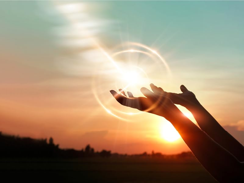 Sun glare being held in hand