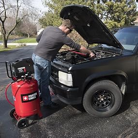Porter-Cable PXCMF220VW Portable Air Compressor Lifestyle, Man and Truck