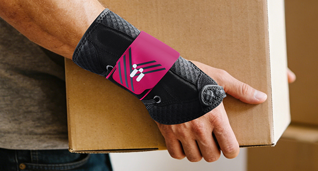 Multiple images showing hands wearing pink and black fingerless workout gloves while handling cardboard boxes and performing lifting tasks.