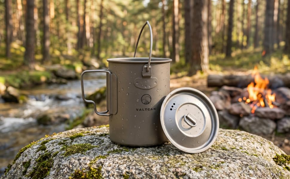 900ml pot in camp grounds next to steam and campfire