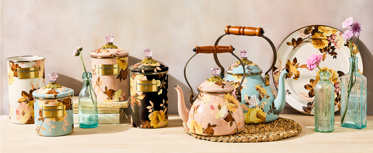Wild Rose floral tea kettles and canisters, with a mauve background.