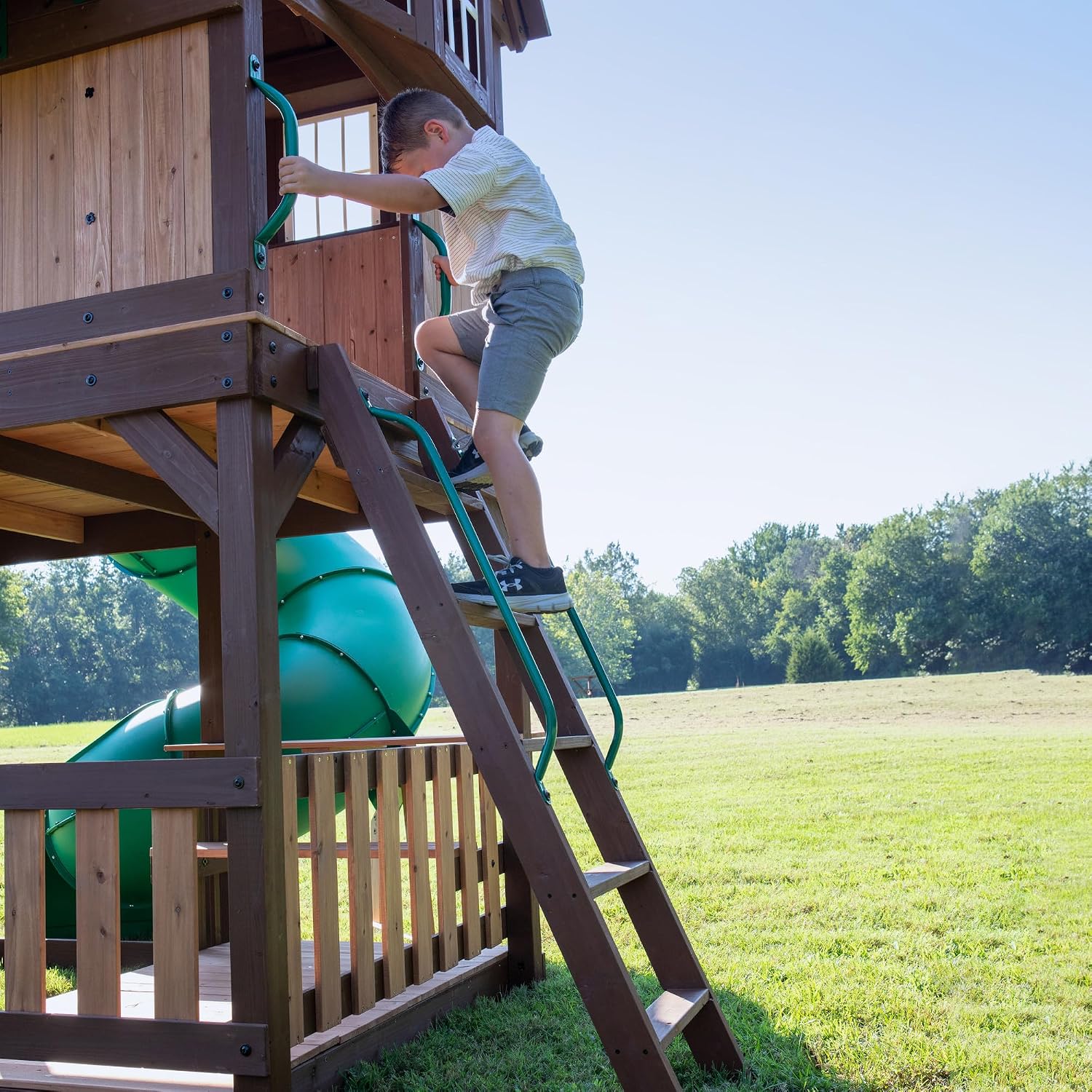 Backyard Discovery Skyfort All Cedar Swing Set, Elevated Covered Wood Roof Clubhouse with Bay Windows, 2 Belt Swings, Web Swing, 10ft Wave Slide