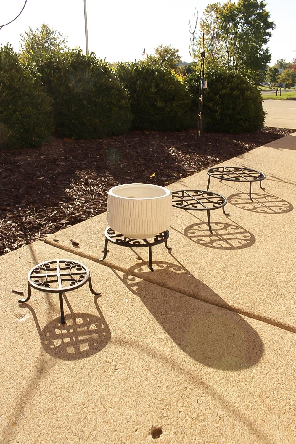 Red Carpet Studios Set of Four Round Black Iron Plant Stands, Scroll Pattern