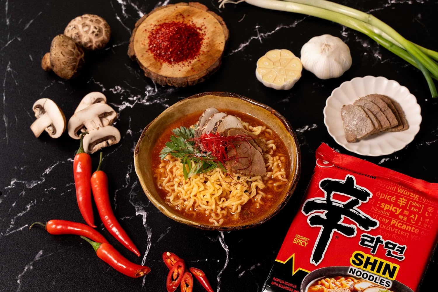 Nongshim Shin Ramyun Noodles, Spicy Korean Signature Instant Ramyun, Rich Beef Flavored Broth, Microwaveable, Korean Instant Noodles, 4.23 oz (Pack of 20), Packaging May Vary.
