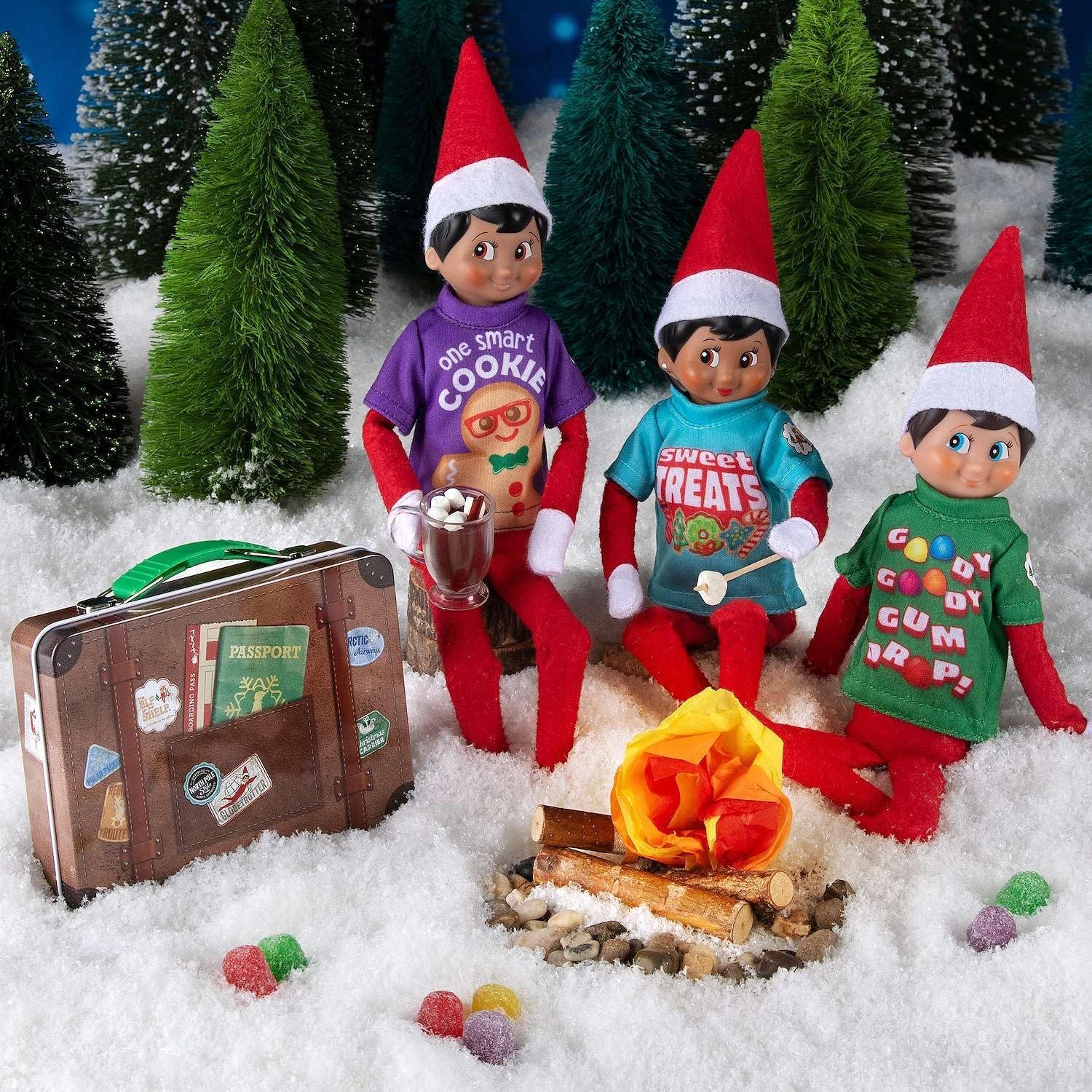 The Elf on the Shelf Claus Couture Suitcase Duo: Sweet Treats Pack and Christmas T-Shirt Party Pack