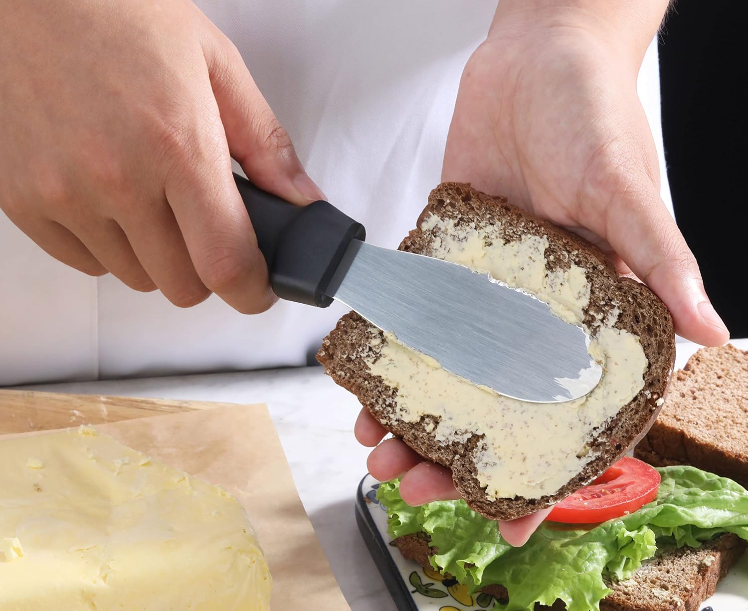 New Star Foodservice Plastic Handle Stainless Steel Butter Spreader, 8.75-Inch, Black, Set of 4